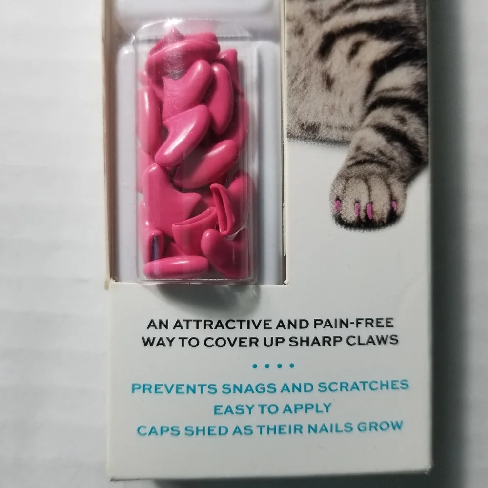 NEW IN BOX WELL AND GOOD CAT NAIL CAPS